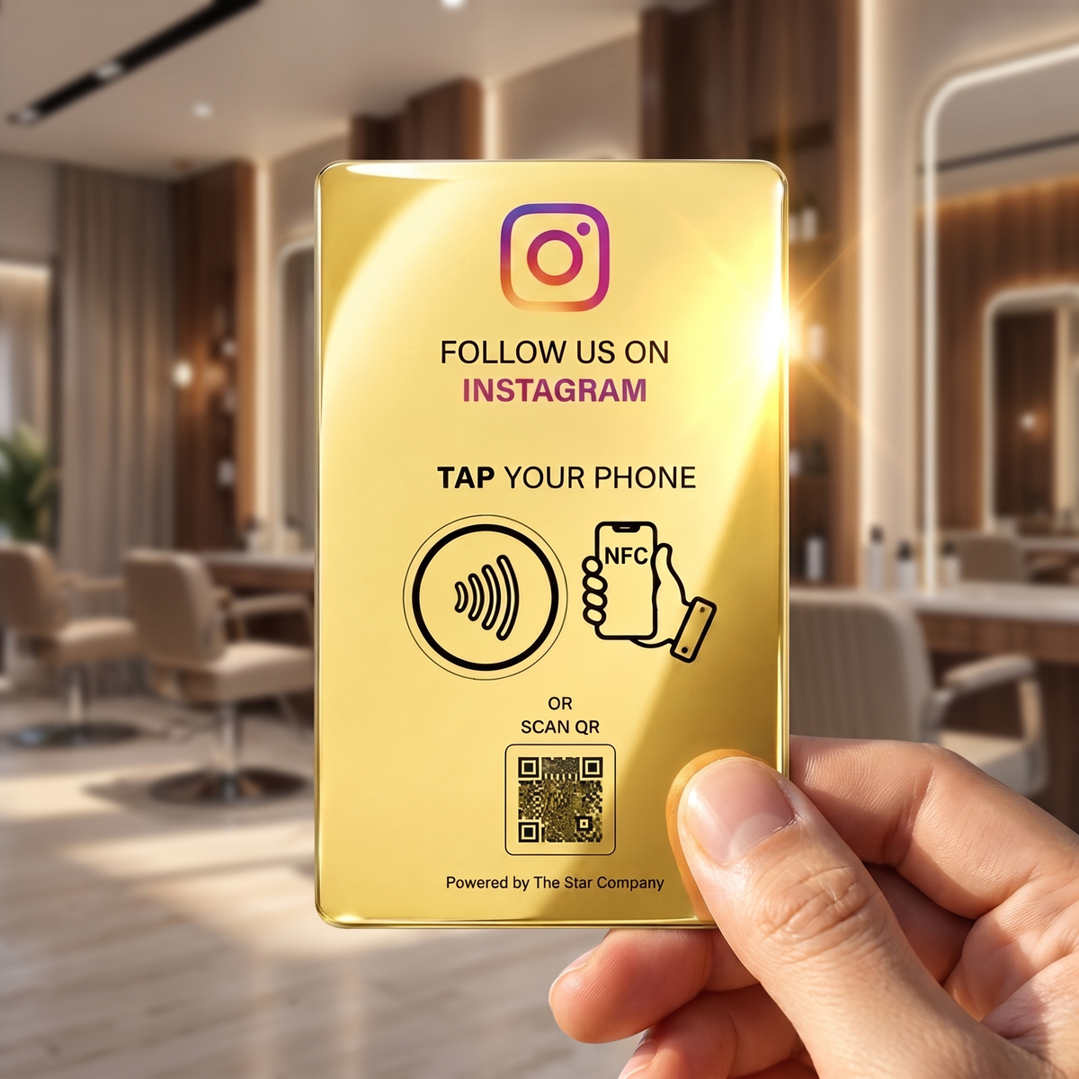 22K gold Instagram Follow Card held in hand, polished metal NFC card with QR code