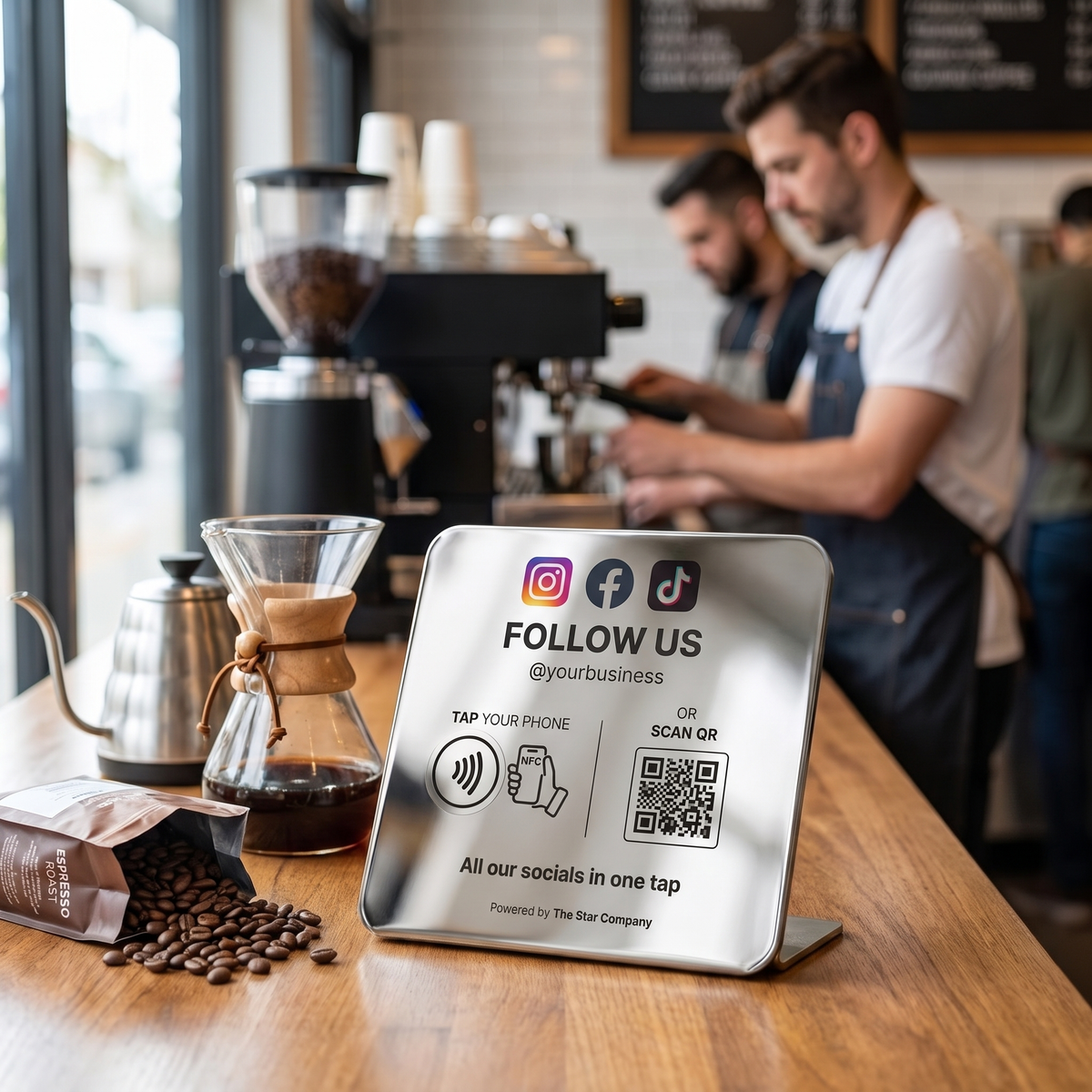 Steel Social Media Follow Plate on a specialty coffee shop counter