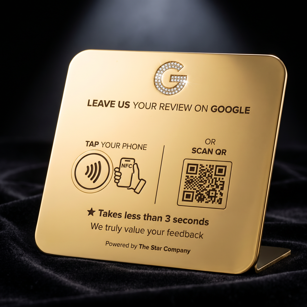 The Sovereign 24K gold Google review plate with diamond pave Google G on black velvet